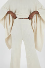 Дамски плетен панталон Eva в цвят off-white с широки крачоли и ластична талия Ellis⠋

